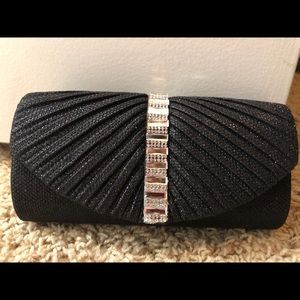 Evening black colored shoulder or hand purse
